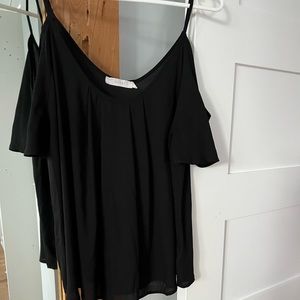 Black shirt off the shoulder